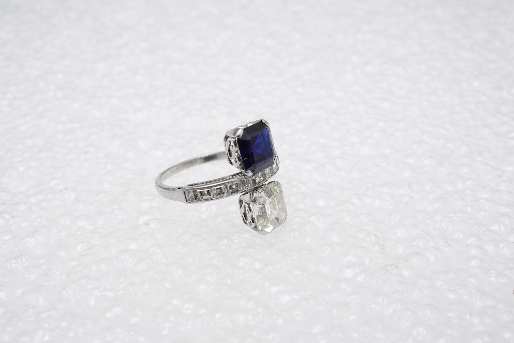 An Art Deco sapphire and diamond 'toi-et-moi' ring, 1930s